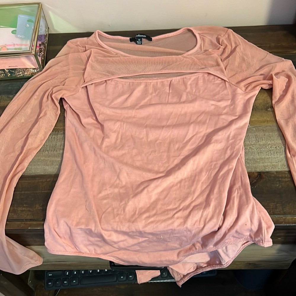 Three womens bodysuits. NEW